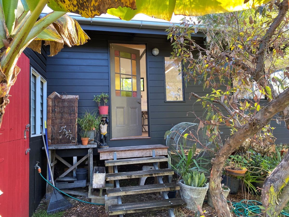 A colour photograph of the front foor to Penny Evans' studio with leadlight detailed door