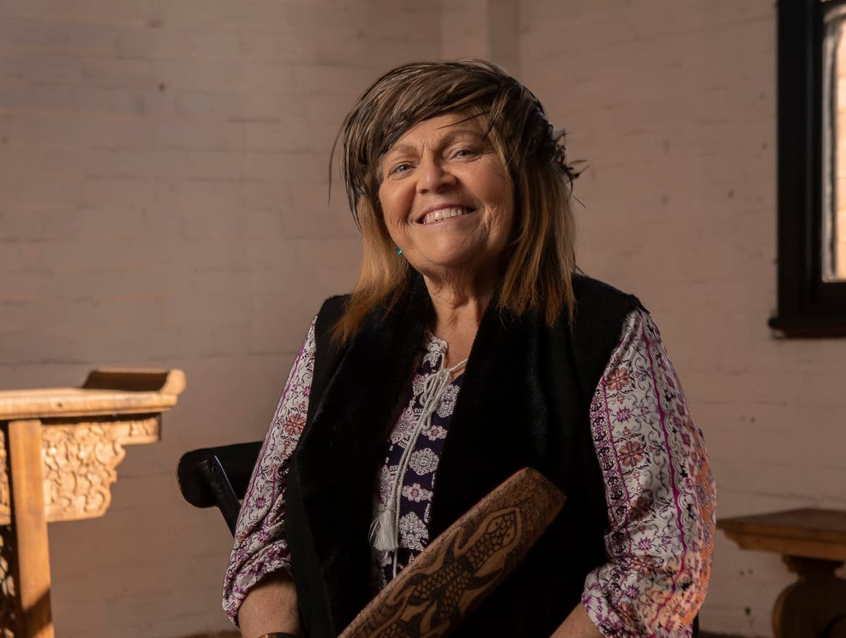 Portrait of a female sitting in a chair