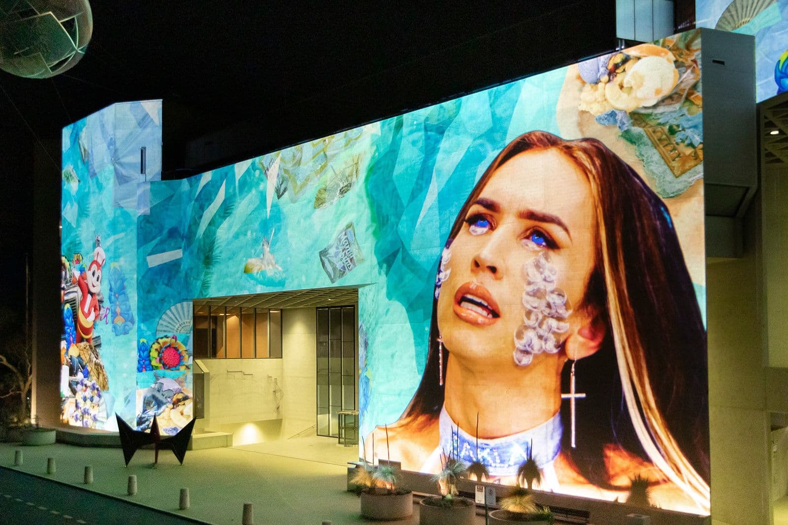 National Gallery facade lit up with colourful video projections