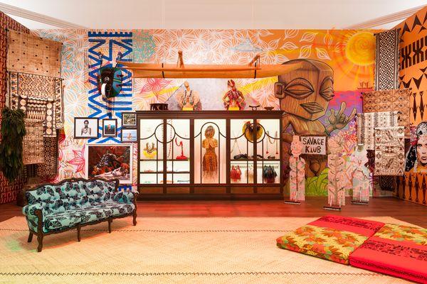 A brightly lit room aordned with colourful furniture and lights.