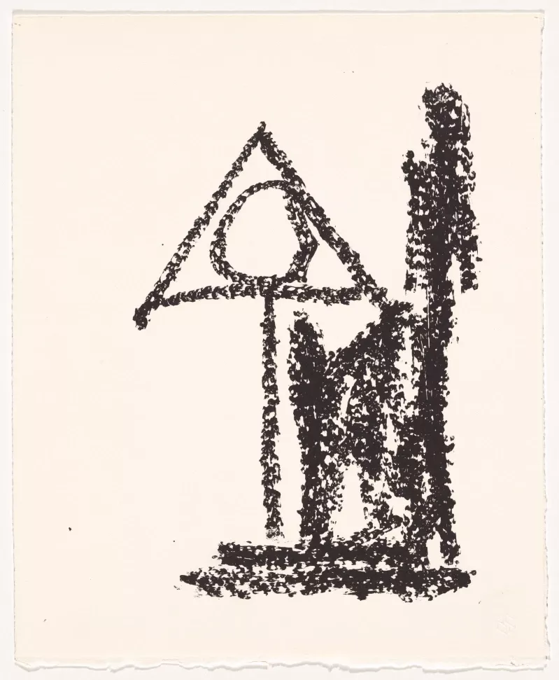 Black triangular shape on cream coloured paper