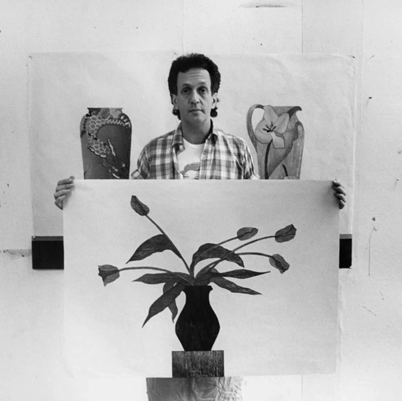 Ed Baynard displaying his 15-colour woodblock print, ’The Blue Tulips’