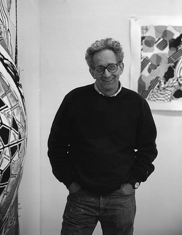 Black and white photograph of Frank Stella