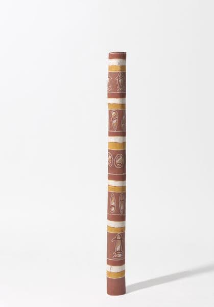 Traditional First Nations burial pole with bream, coneshell and clam imagery