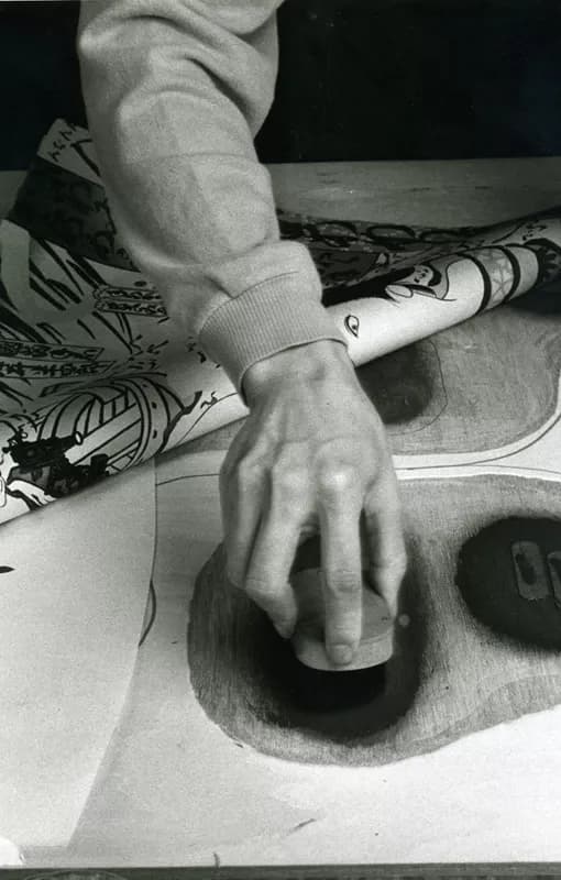 Yasuyuki Shibata moistening relief areas of carved woodblock for Masami Teraoka’s ‘Kunisada Eclipsed’ from ‘Hawaii Snorkel Series’ with a brush prior to inking