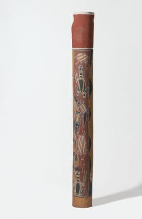 Tall, Wide ochre pole with traditional lizard motifs painted in black, yellow, white and ochre