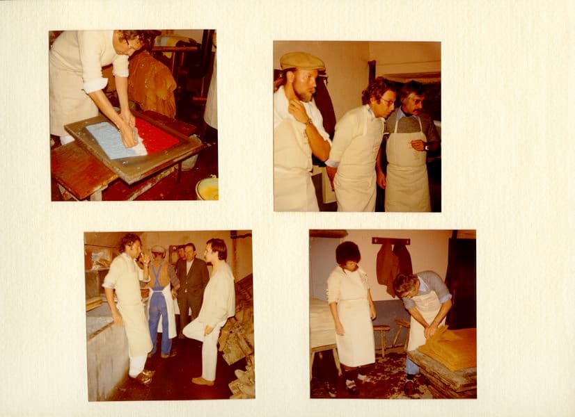 Scrapbook page with 4 photographs of artists in the print studio