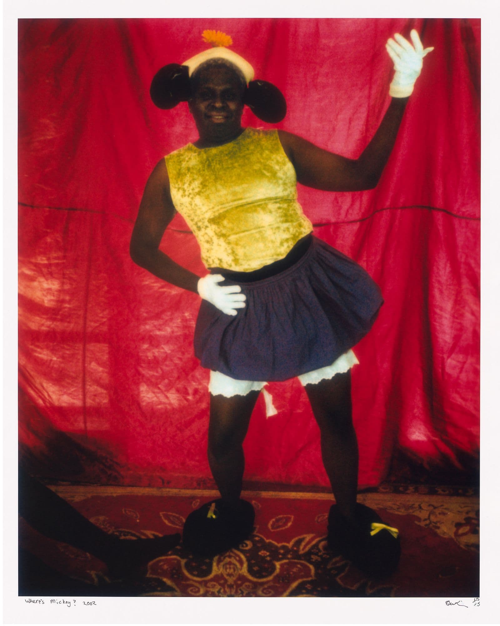 Photograph of First Nations person dressed as Mickey Mouse.