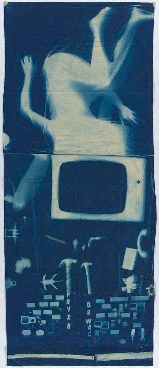 A cyanotype in blue of a human silhouette with a TV for a head and various household objects