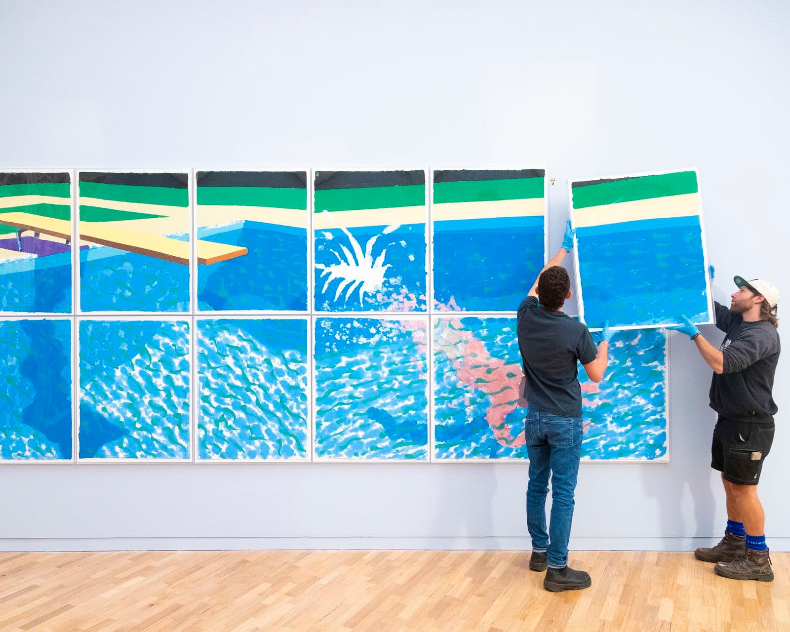 Photograph of installation of Hockney's 'A diver, paper pool 17' 1978