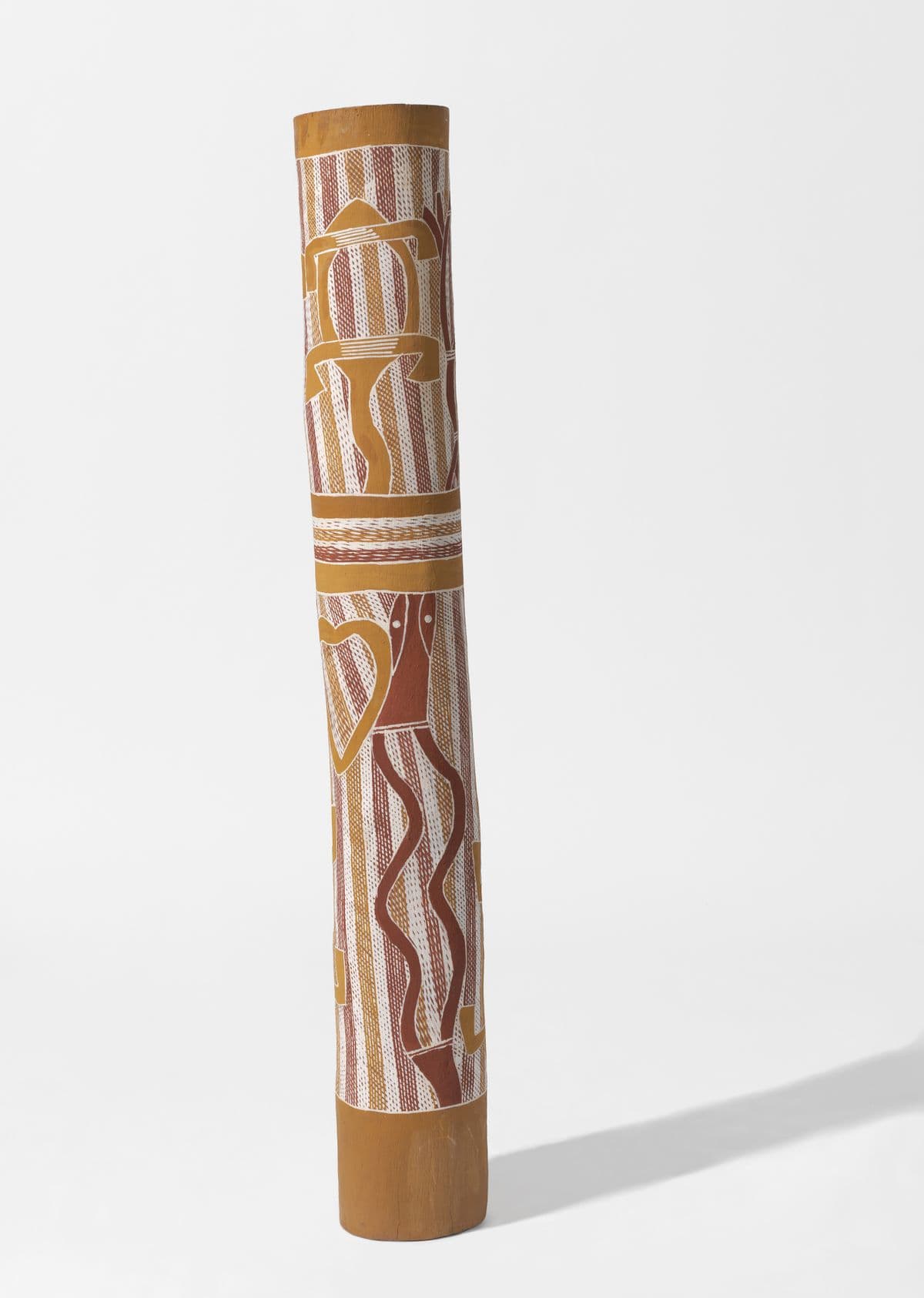 Wide pole with yellow ochre, red ochre, and white cross hatch patterning and animal imagery
