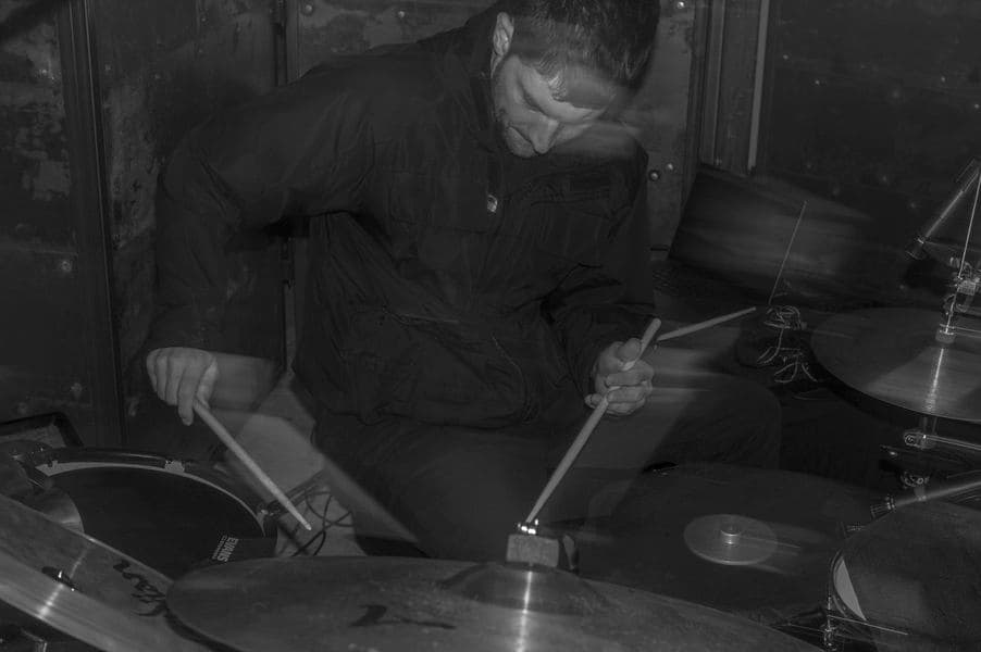 A black and white photo of a percussionist.