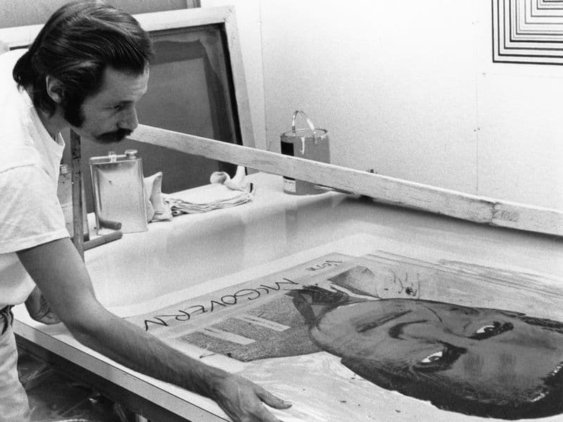 Printer Jeffrey Wasserman inspects a proof of 'Vote McGovern' by Andy Warhol, Gemini GEL, Los Angeles, 1972