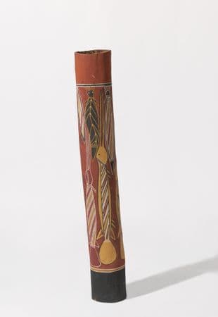 Shorter pole with slight left lean, ochre in colour with traditionally painted catfish, blackfish, gasfish in yellow, white and black