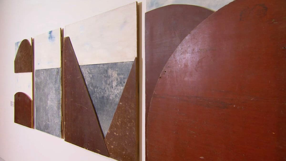 Video still of artwork on wall.