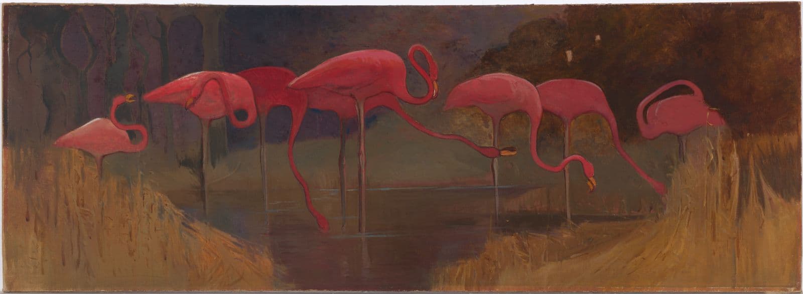 Eight pink flamingoes stand in a body of water, some dipping their beaks into the water