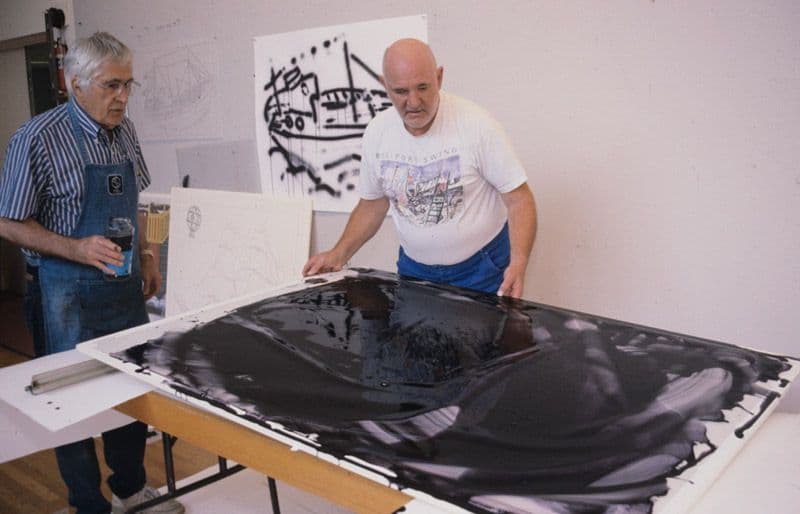 Malcolm Morley and Kenneth Tyler using lithographic tusche in preparation for blue colour separation for ‘Pamela running before the wind with a Dutch lighthouse’